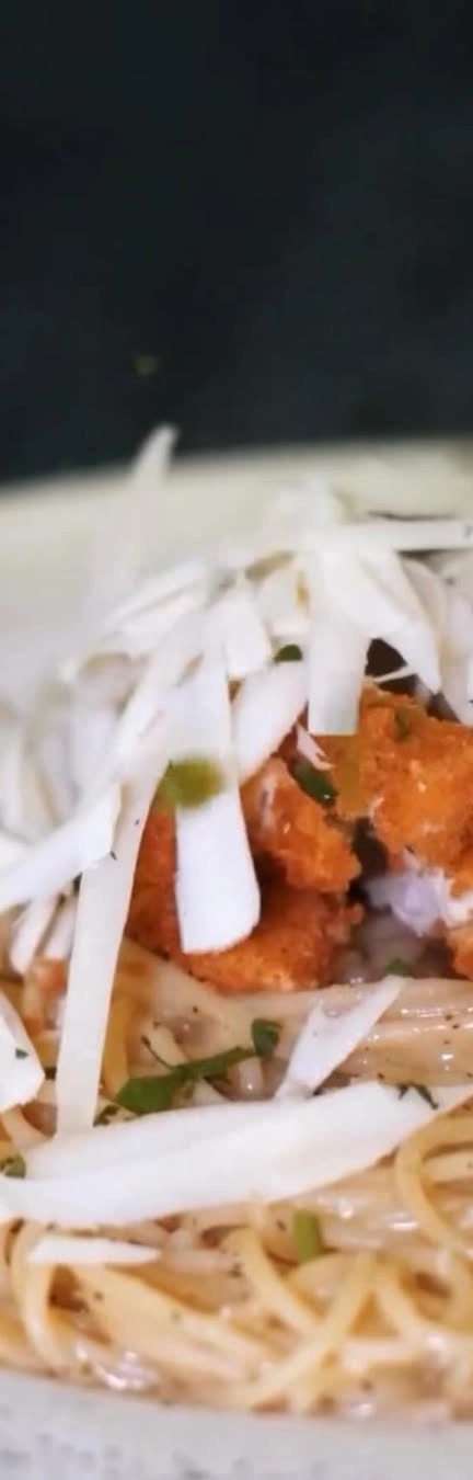 caccio pepe topped with chicken cutlet